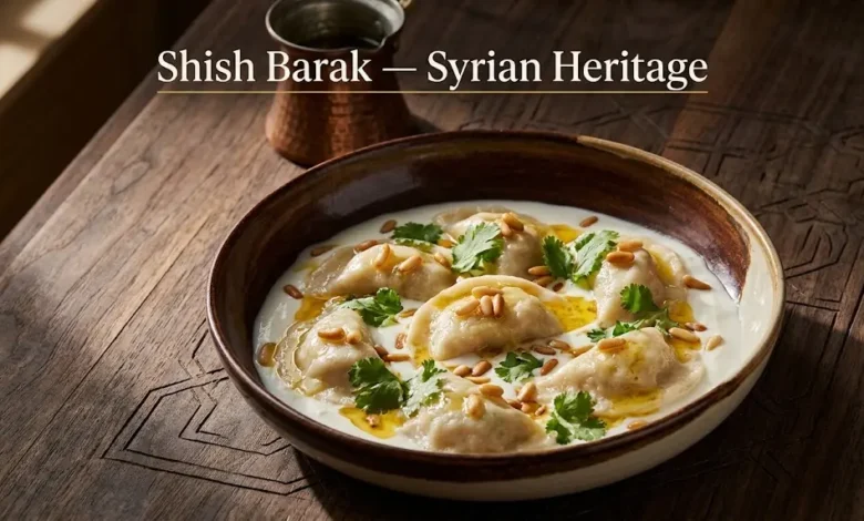 Traditional Syrian shish barak served in a handmade ceramic bowl with yogurt sauce, toasted pine nuts, and clarified butter